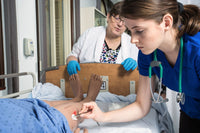 Load image into Gallery viewer, CAE Complete JUNO Nursing Skill Training Manikin w/ Tablet - American Hospital Supply
