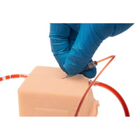 Load image into Gallery viewer, CAE Medicor MultiCUBE Trainer Model for Urinary Catheterization - Light - American Hospital Supply
