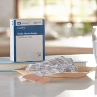 Load image into Gallery viewer, Curity™ Tan Adhesive Strip, 1 x 3 Inch - American Hospital Supply
